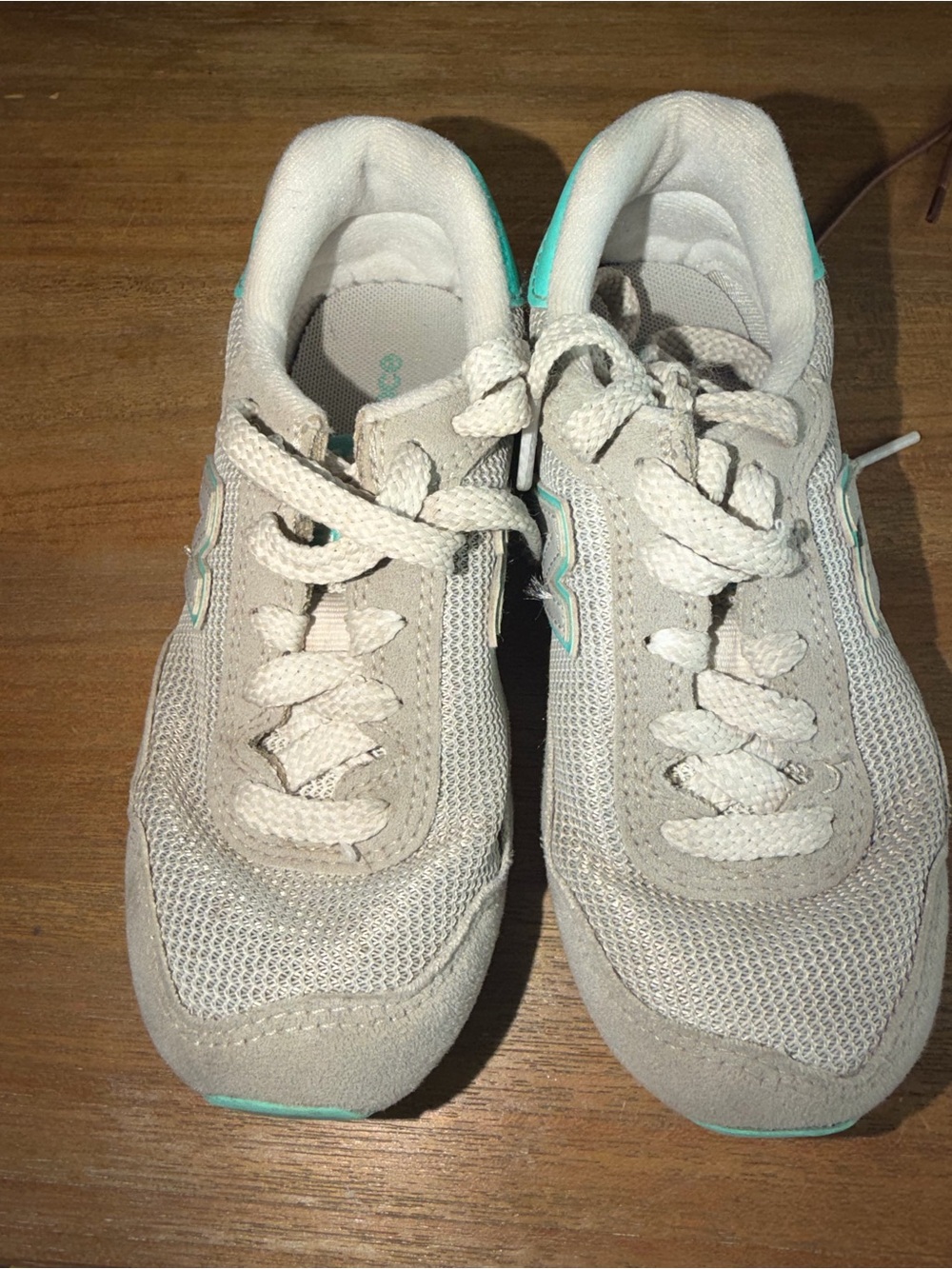 New Balance Women's Beige Sneakers with Teal Accent